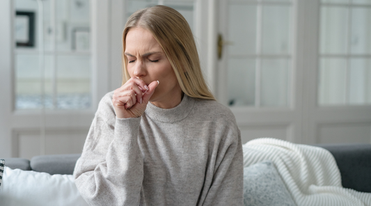 Sick female coughing and has viral infection