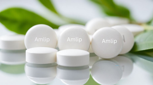 Amlip tablet on a reflective surface