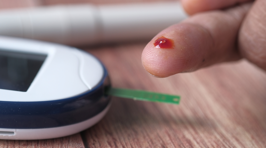 Close-up of Person Using a Blood Glucose Monitor