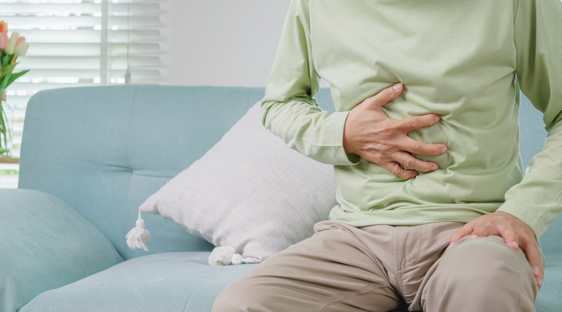 Man with stomach pain due to constipation.